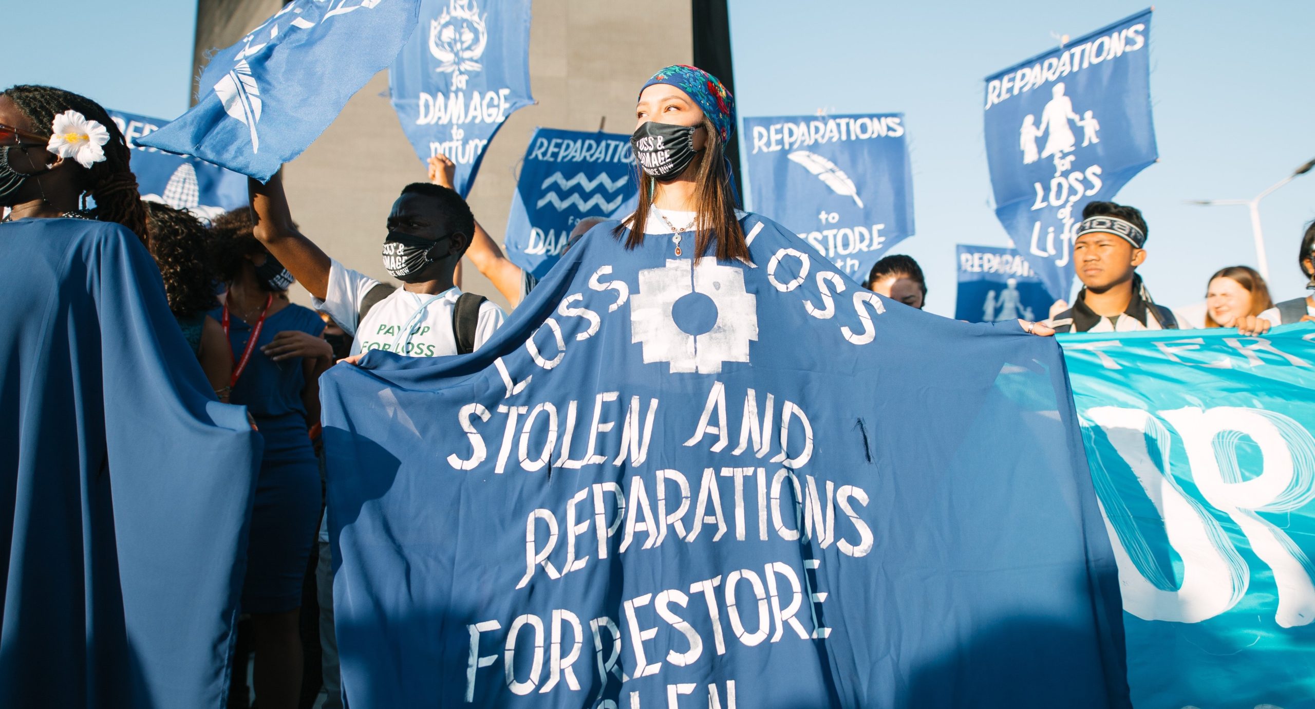 Huge Civil Society protest floods the COP to demand biggest Fossil Fuel Polluters to PAY UP NOW for loss and damage